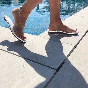 Chanel patterned flat with a PVC and lucite strap